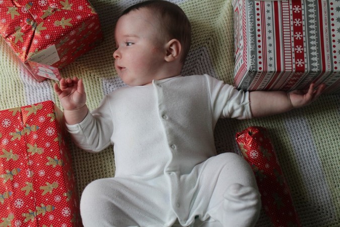 baby boy with presents