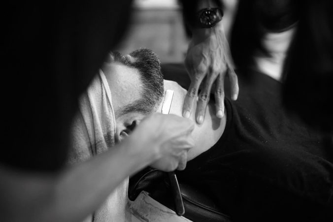 shaving at a barbershop